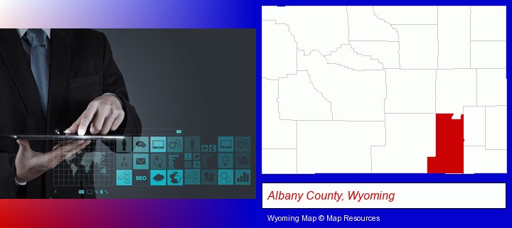 information technology concepts; Albany County, Wyoming highlighted in red on a map