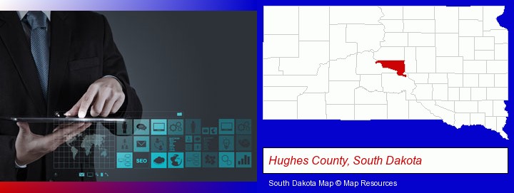 information technology concepts; Hughes County, South Dakota highlighted in red on a map