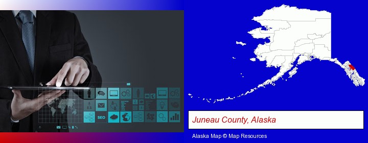 information technology concepts; Juneau County, Alaska highlighted in red on a map