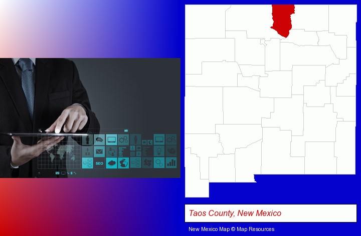 information technology concepts; Taos County, New Mexico highlighted in red on a map