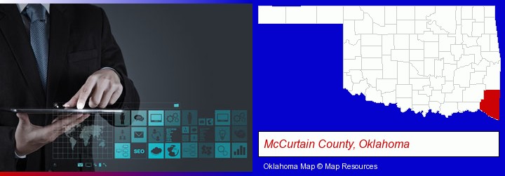information technology concepts; McCurtain County, Oklahoma highlighted in red on a map